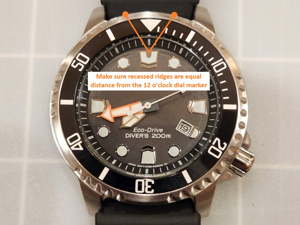 Bezel insert sitting flush and even with the watch crystal and bezel edge