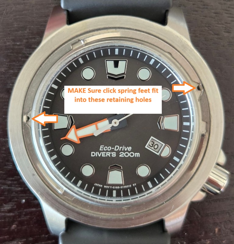 Spring clip holes in the bezel assembly